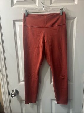 Nike Dri-FIT lux one High-Waist Leggings in Rust